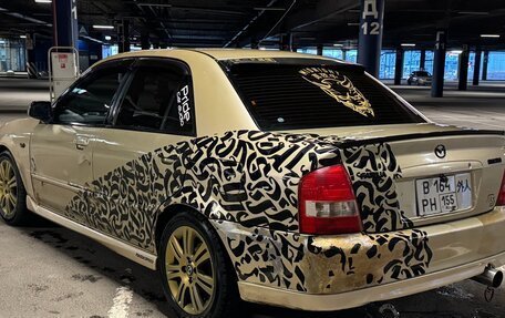 Mazda Familia, 2000 год, 450 000 рублей, 6 фотография