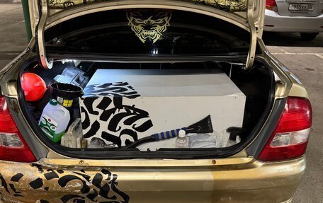 Mazda Familia, 2000 год, 450 000 рублей, 24 фотография