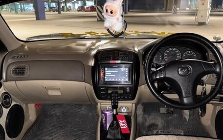 Mazda Familia, 2000 год, 450 000 рублей, 17 фотография