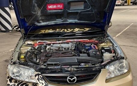 Mazda Familia, 2000 год, 450 000 рублей, 15 фотография