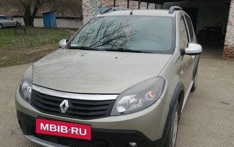 Renault Sandero I, 2013 год, 750 000 рублей, 2 фотография