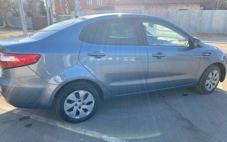 KIA Rio III рестайлинг, 2012 год, 870 000 рублей, 21 фотография