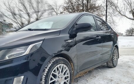 KIA Rio III рестайлинг, 2011 год, 620 000 рублей, 2 фотография