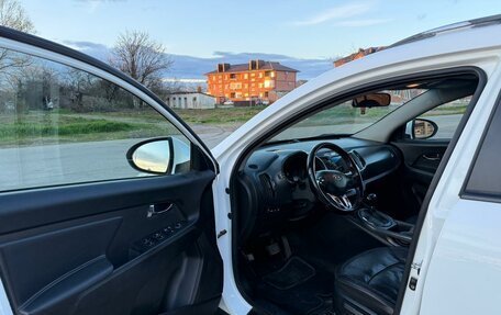 KIA Sportage III, 2011 год, 18 фотография