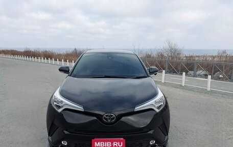 Toyota C-HR I рестайлинг, 2019 год, 2 050 000 рублей, 21 фотография