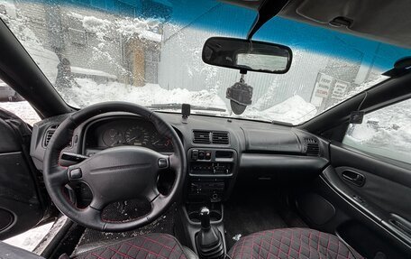 Mazda 323, 1997 год, 130 000 рублей, 11 фотография