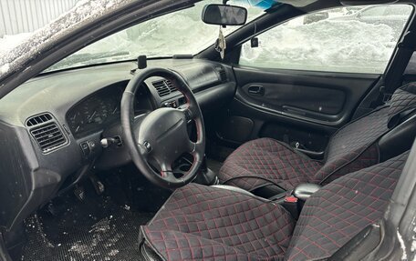 Mazda 323, 1997 год, 130 000 рублей, 10 фотография