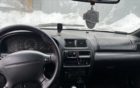 Mazda 323, 1997 год, 130 000 рублей, 12 фотография