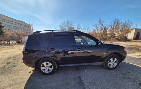 Mitsubishi Outlander III рестайлинг 3, 2011 год, 1 450 000 рублей, 4 фотография