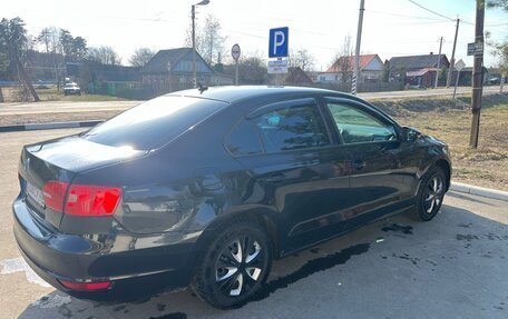 Volkswagen Jetta VI, 2011 год, 730 000 рублей, 4 фотография