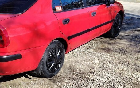 Mitsubishi Carisma I, 2001 год, 300 000 рублей, 21 фотография