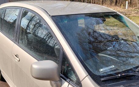 Nissan Tiida, 2010 год, 750 000 рублей, 5 фотография