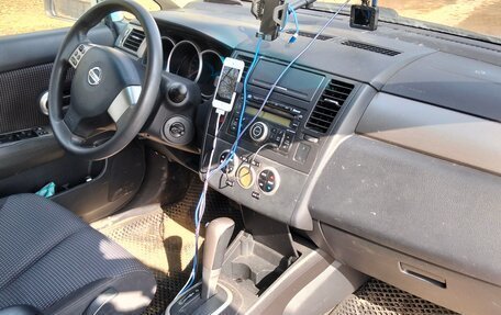 Nissan Tiida, 2010 год, 750 000 рублей, 13 фотография