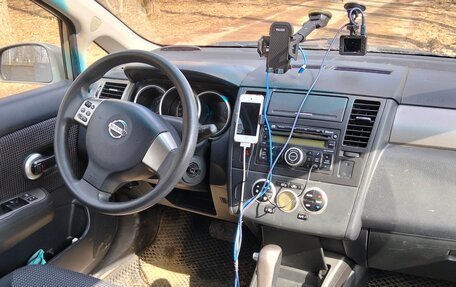 Nissan Tiida, 2010 год, 750 000 рублей, 9 фотография