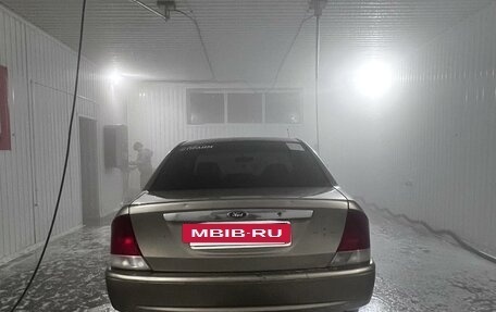 Ford Laser IV, 1999 год, 170 000 рублей, 6 фотография