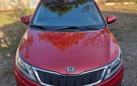 KIA Rio III рестайлинг, 2012 год, 830 000 рублей, 2 фотография