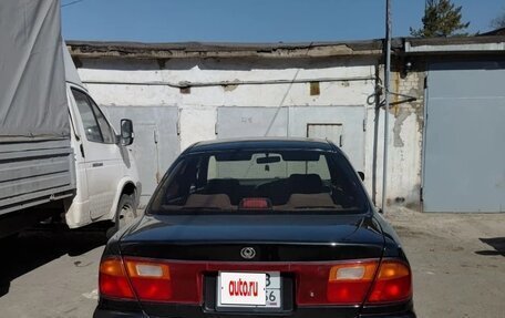 Mazda Familia, 1995 год, 265 000 рублей, 4 фотография