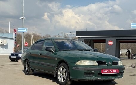 Mitsubishi Carisma I, 1999 год, 140 000 рублей, 1 фотография