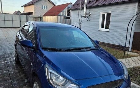 Hyundai Solaris II рестайлинг, 2011 год, 800 000 рублей, 13 фотография