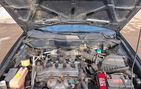 Nissan Almera, 2004 год, 13 фотография