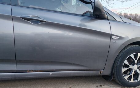 Hyundai Solaris II рестайлинг, 2011 год, 650 000 рублей, 10 фотография