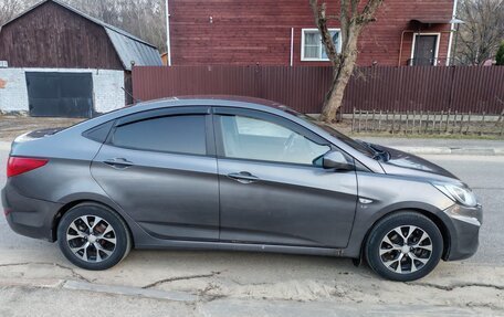 Hyundai Solaris II рестайлинг, 2011 год, 650 000 рублей, 9 фотография