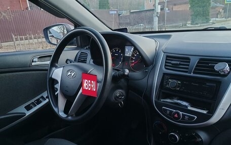 Hyundai Solaris II рестайлинг, 2011 год, 650 000 рублей, 22 фотография