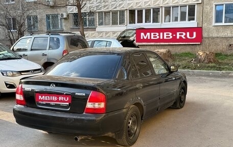 Mazda Protege, 2000 год, 250 000 рублей, 7 фотография