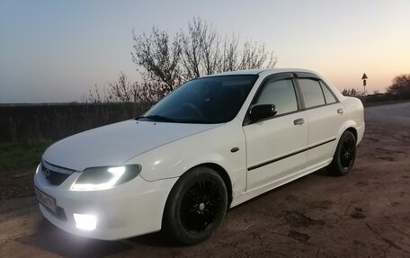 Mazda Familia, 2001 год, 290 000 рублей, 9 фотография