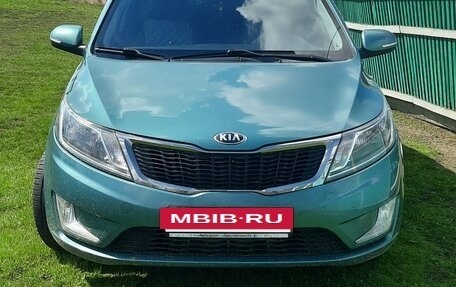 KIA Rio III рестайлинг, 2013 год, 900 000 рублей, 2 фотография