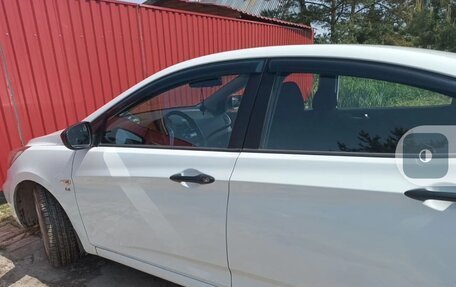 Hyundai Solaris II рестайлинг, 2011 год, 630 000 рублей, 4 фотография