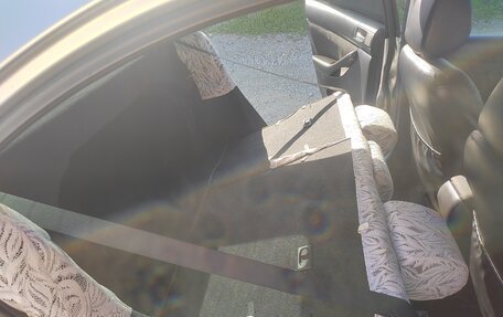 Toyota Avensis III рестайлинг, 2006 год, 850 000 рублей, 24 фотография