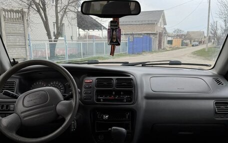 Chevrolet Tracker II, 2000 год, 250 000 рублей, 8 фотография