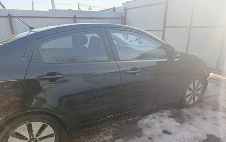 KIA Rio III рестайлинг, 2011 год, 700 000 рублей, 13 фотография