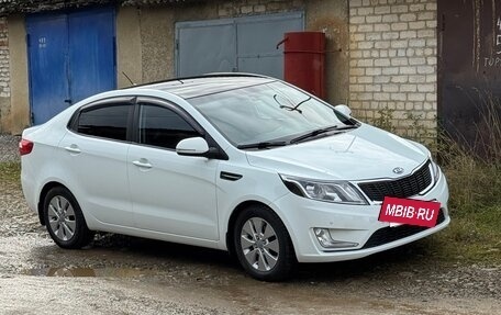 KIA Rio III рестайлинг, 2012 год, 880 000 рублей, 2 фотография