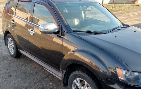 Mitsubishi Outlander III рестайлинг 3, 2011 год, 750 000 рублей, 2 фотография