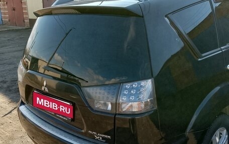 Mitsubishi Outlander III рестайлинг 3, 2011 год, 750 000 рублей, 5 фотография