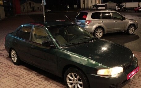 Mitsubishi Mirage VI рестайлинг, 2000 год, 180 000 рублей, 4 фотография