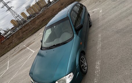 Mazda 323, 1998 год, 150 000 рублей, 10 фотография