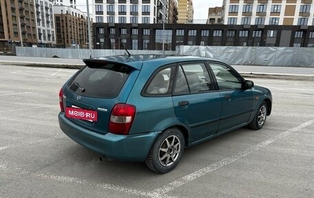 Mazda 323, 1998 год, 150 000 рублей, 6 фотография