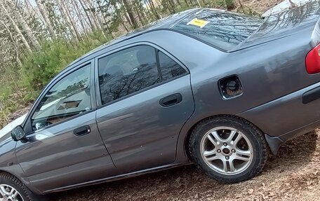 Mitsubishi Carisma I, 2003 год, 235 000 рублей, 3 фотография