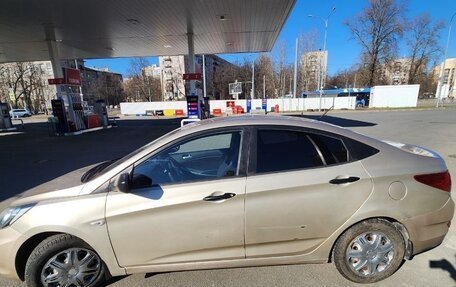 Hyundai Solaris II рестайлинг, 2011 год, 520 000 рублей, 24 фотография