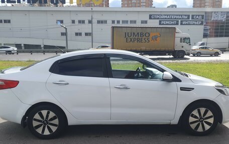 KIA Rio III рестайлинг, 2012 год, 749 000 рублей, 2 фотография