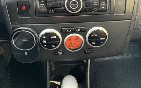 Nissan Tiida, 2010 год, 650 000 рублей, 9 фотография