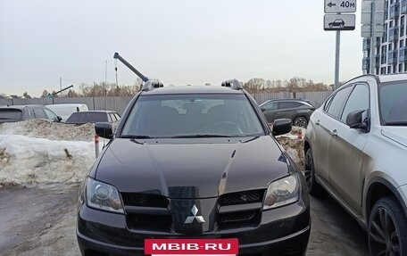 Mitsubishi Outlander III рестайлинг 3, 2004 год, 700 000 рублей, 13 фотография