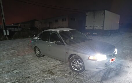 Mitsubishi Mirage VI рестайлинг, 2001 год, 110 000 рублей, 2 фотография