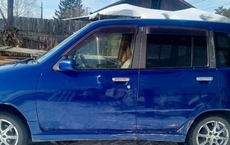 Nissan Cube II, 2001 год, 110 000 рублей, 2 фотография