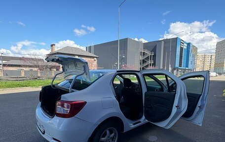 Renault Logan II, 2021 год, 900 000 рублей, 13 фотография