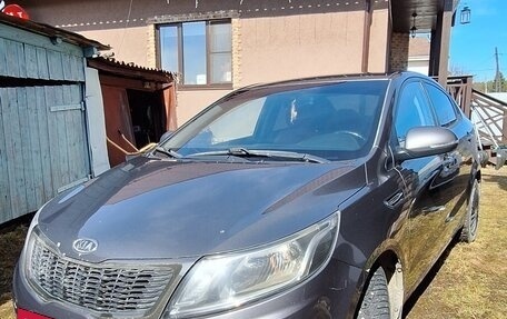 KIA Rio III рестайлинг, 2012 год, 750 000 рублей, 2 фотография