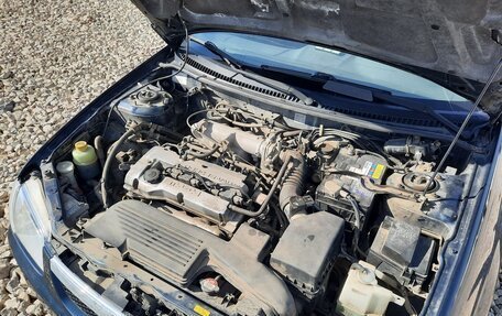 Mazda 323, 1999 год, 450 000 рублей, 8 фотография